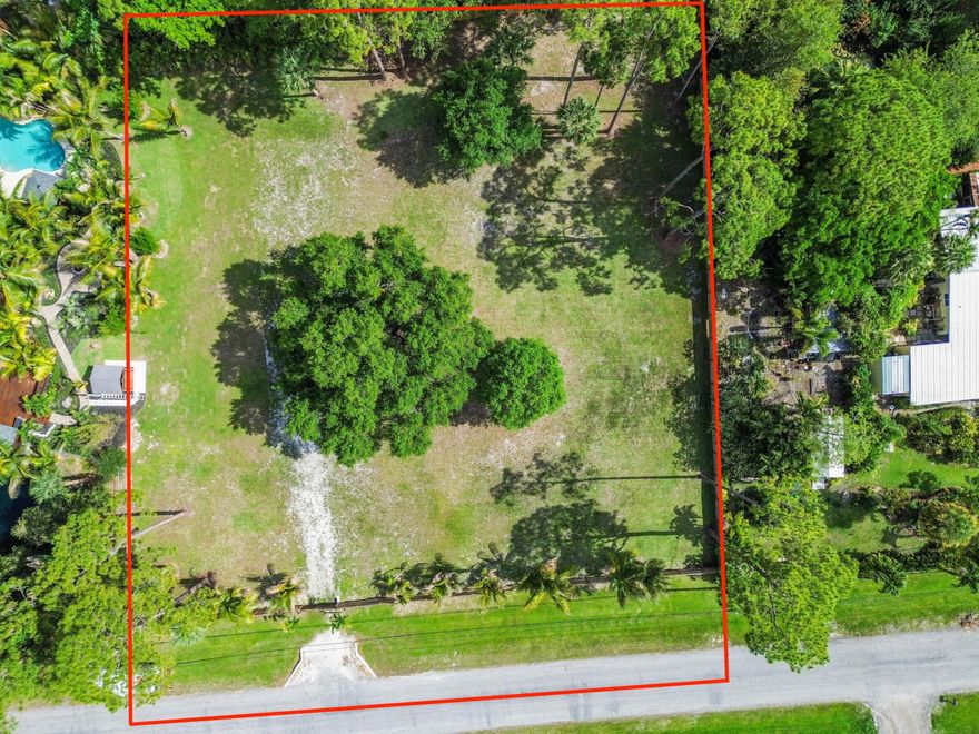 Discover the perfect opportunity to build your ultimate Florida retreat on this expansive, prime vacant lot in the highly desirable community. Offering a rare blend of tranquil country living and unbeatable convenience, this pristine piece of land is a blank canvas just waiting for your vision.   Also, available is the property directly to the east which is currently on the market. Property address is 13480 42nd Rd and MLS number is B26034161.   The lot has already been cleared & grated and is ready to be built on and includes full fencing! This generous parcel provides endless possibilities to design and construct a custom home exactly to your specifications.  With plenty of acreage to work with, you will have more than enough room to add a resort-style pool, build a detached garage or workshop, plant a thriving garden, or even bring your horses. It is also the ideal setup for securely storing your RV, boat, and all your recreational toys right on your own property. Enjoy the peace, privacy, and breathing room of a rural, agricultural-residential lifestyle while remaining just a short drive from modern conveniences. You will be minutes away from top-rated schools, local parks, grocery stores, and major highways, with the world-class shopping, dining, and beautiful beaches of West Palm Beach all within easy reach. This property offers ample space for a custom estate, outbuildings, and a pool. With no HOA to limit you, you are free to park your RVs, boats, and commercial vehicles. As an equestrian-friendly property, there is plenty of room to accommodate horses and enjoy the area's local trails. It truly provides the perfect balance of secluded country living and city accessibility. Do not miss this chance to secure your own slice of paradise in one of West Palm Beach's most sought-after acreage communities. Walk the lot, dream big, and start planning your future today!
