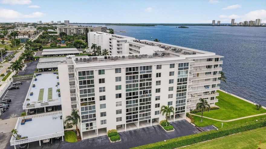 This WATERFRONT, 7th Floor CORNER Unit is Paradise!  Newly renovated 2 yrs ago, it has stunning S, SE and SW views of the ICW, Singer Island and Lake Park Marina. Modern elegance abounds...with French doors opening to the Primary Suite with water-views and walk-in closet. It features Hurricane Impact Windows, state-of-the art Samsung Kitchen Appliances, and Tankless Water Heater. This gated community is located beside the luxurious Nautilus 220, numerous restaurants, Recreational Park with tennis/pickleball and Marina with a boat club and direct access to the ocean!  It's minutes to the beach, PBI airport, shopping Malls and Downtown West Palm Beach. The HOA monthly fee is INCLUSIVE of the Building's Insurance Premiums, unlike other Condo's that bill separately for each.