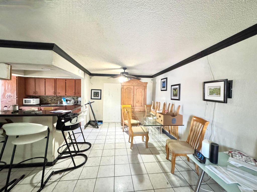 Photo of 4310 NE 1st Terrace, Pompano Beach, FL 33064 (MLS # B26011320)