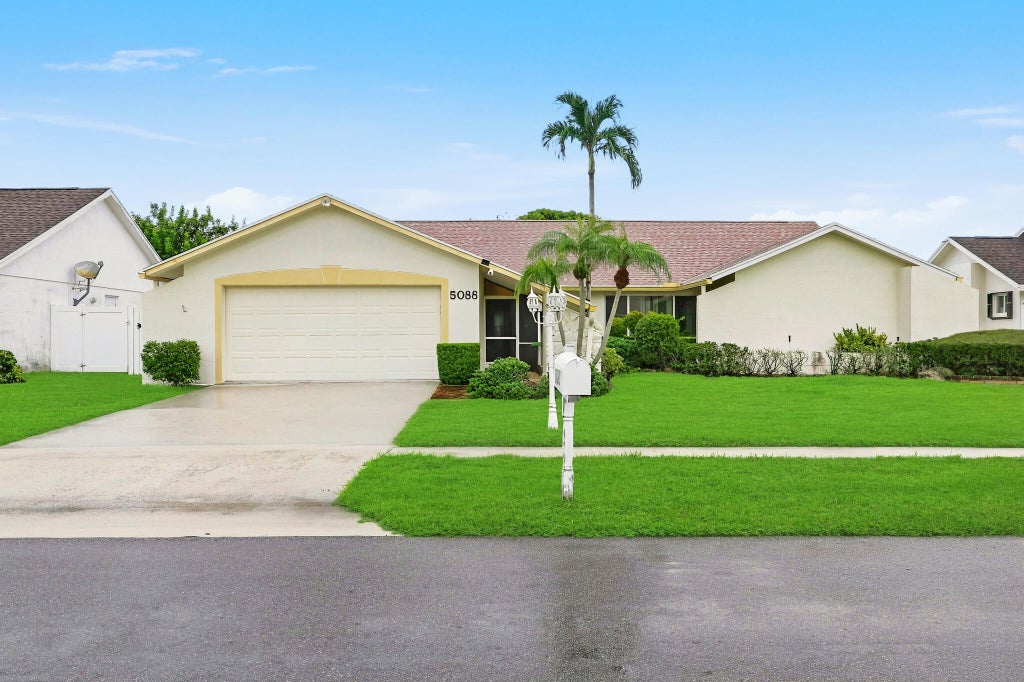Photo of 5088 Chelan Way, Lake Worth, FL 33467 (MLS # B26071500)