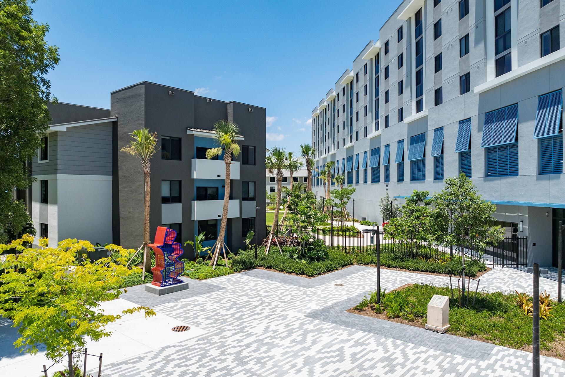 Enjoy modern conveniences while living in a park-like setting. Outdoor amenities include a dog park and covered gazebo along with nearly one-acre of central green space. Indoors you'll find a clubroom equipped with arcade games and large-screen TVs adjacent to the landscaped courtyard. Residences at SoMi Parc also offers a state-of-the-art fitness center and multiple convenient spaces for remote working and private conferences.