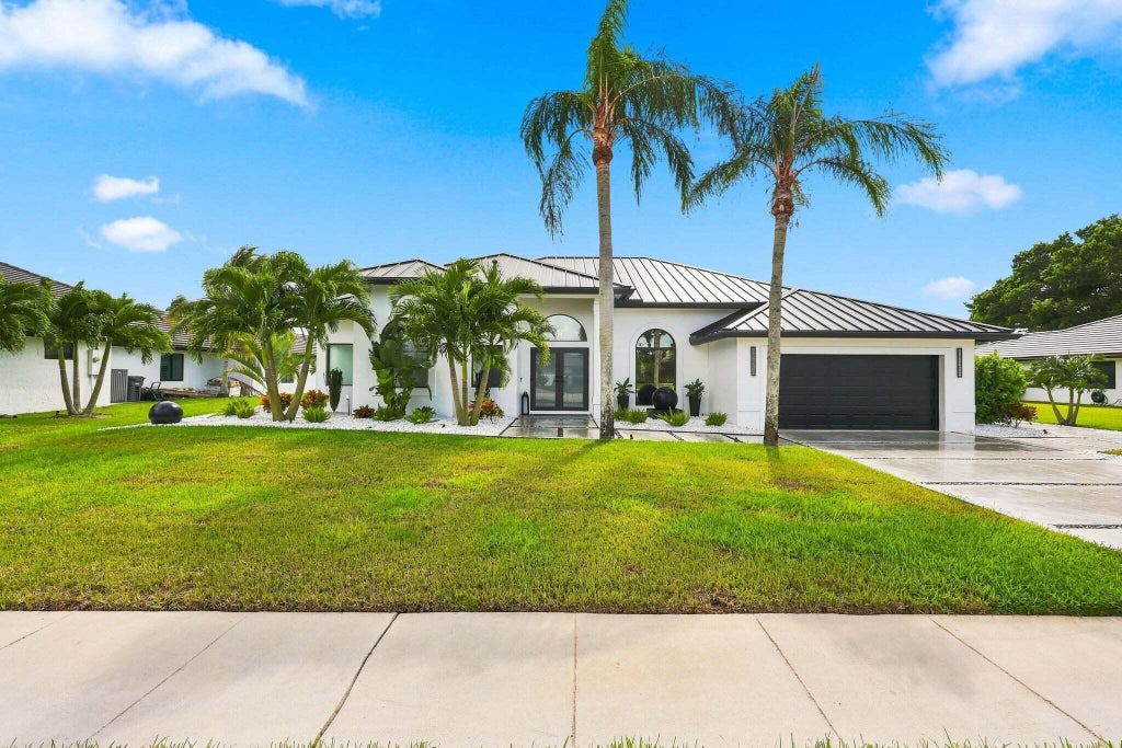 Photo of 11145 Boca Woods Lane, Boca Raton, FL 33428 (MLS # B26094066)