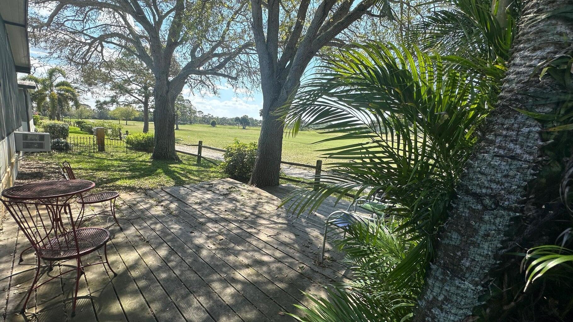 YOU OWN THE LAND!Cambridge is a premier 55+ community,with LOW HOA fees.This golf course view offers a serene landscape,with amazing sunsets.The open-concept living and dining area provides a seamless flow,leading to a kitchen island.The main suite serves as a peaceful retreat, boasting a spacious walk-in closet and a private en-suite bath. The second bedroom connects to the guest bathroom,providing a comfortable and private space for visitors.This home's great location offers easy access to US-1 and is just minutes from a variety of restaurants,beaches, boatramps and parks,making it a fantastic opportunity to live the quintessential South Florida lifestyle.This home is waiting for your personal touches!Shuffleboard,dinner dances, heated pool, billiards,exercise room in the clubhouse.