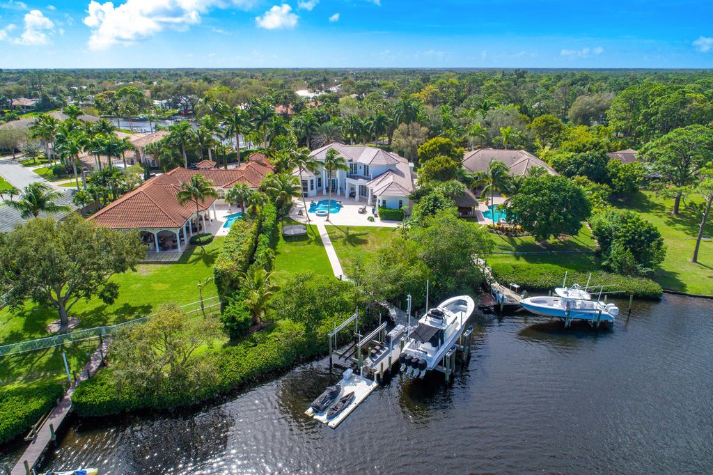 Photo of 8709 SE Compass Island Way, Jupiter, FL 33458 (MLS # B26031104)