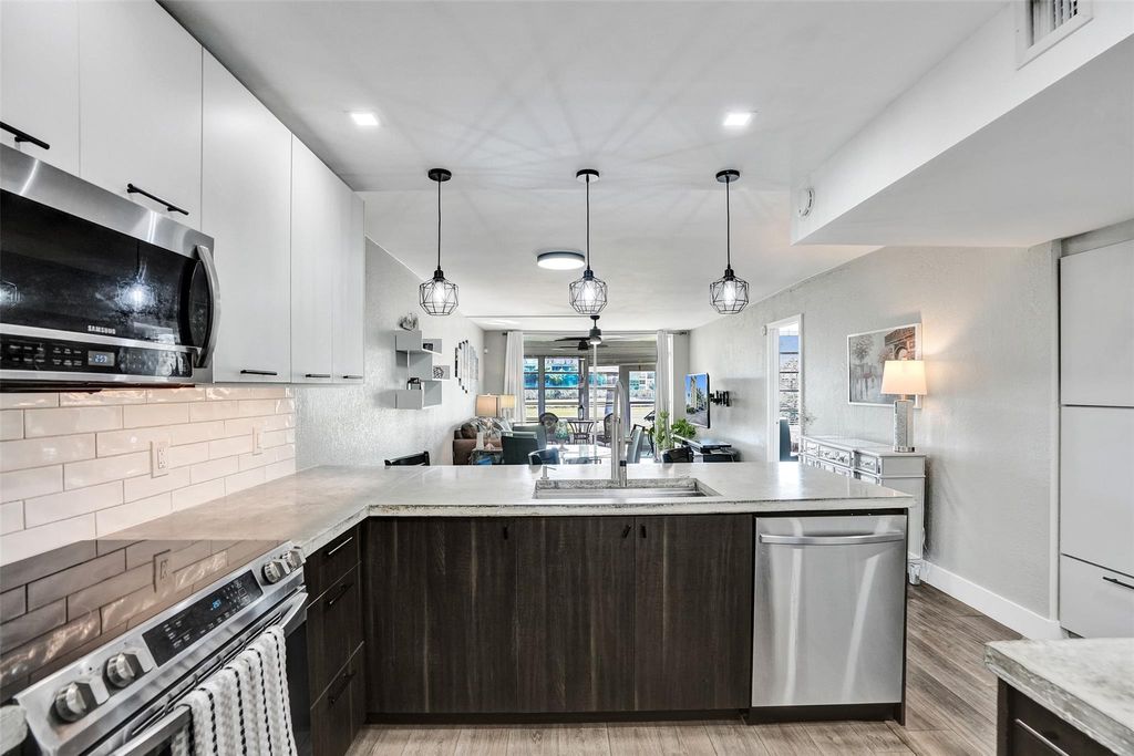 Photo of 3001 S Course Dr #107, Pompano Beach, FL 33069 (MLS # F10537527)