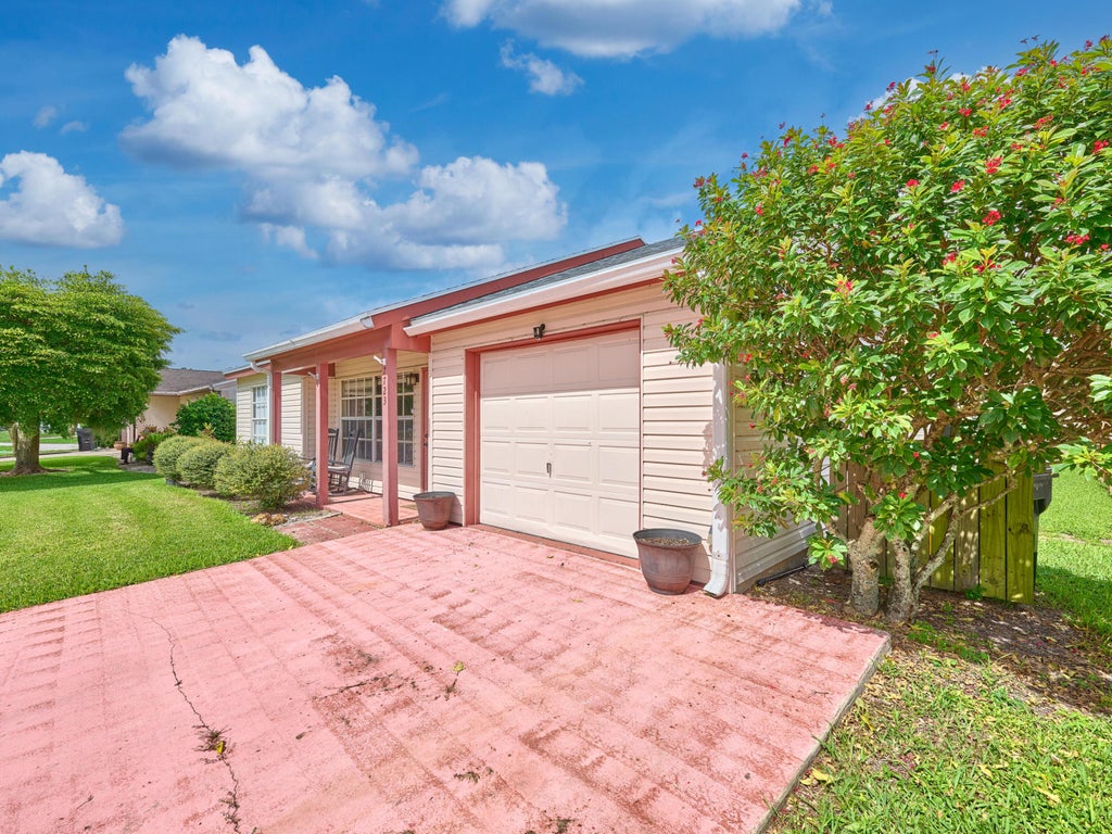 Photo of 7723 CANAL Drive, Lake Worth, FL 33467 (MLS # B26092368)