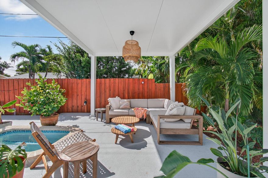 Welcome to 802 Mallard Drive, a fully furnished seasonal escape in Delray's Tropic Palms designed for easy, indulgent living. This stylish 2BR/2BA pool home features Maiden Home, West Elm, and Restoration Hardware pieces, plus a chef's kitchen with Bosch appliances, quartz counters, Wi-Fi oven, pot filler, and wine fridge. Enjoy plush towels, robes, an inflatable paddleboard, and a spacious owner's suite with a walk-in closet and washer/dryer. Outside awaits a saltwater pool, jacuzzi, covered seating, lush landscaping, smart irrigation, and a fenced yard with lanai. Minutes to the beach, Atlantic Ave, tennis center, Whole Foods, Trader Joe's, and shops. Extra twin mattress available, plus flex desks in the primary and bonus area. Perfectly centered between Delray and Boca.