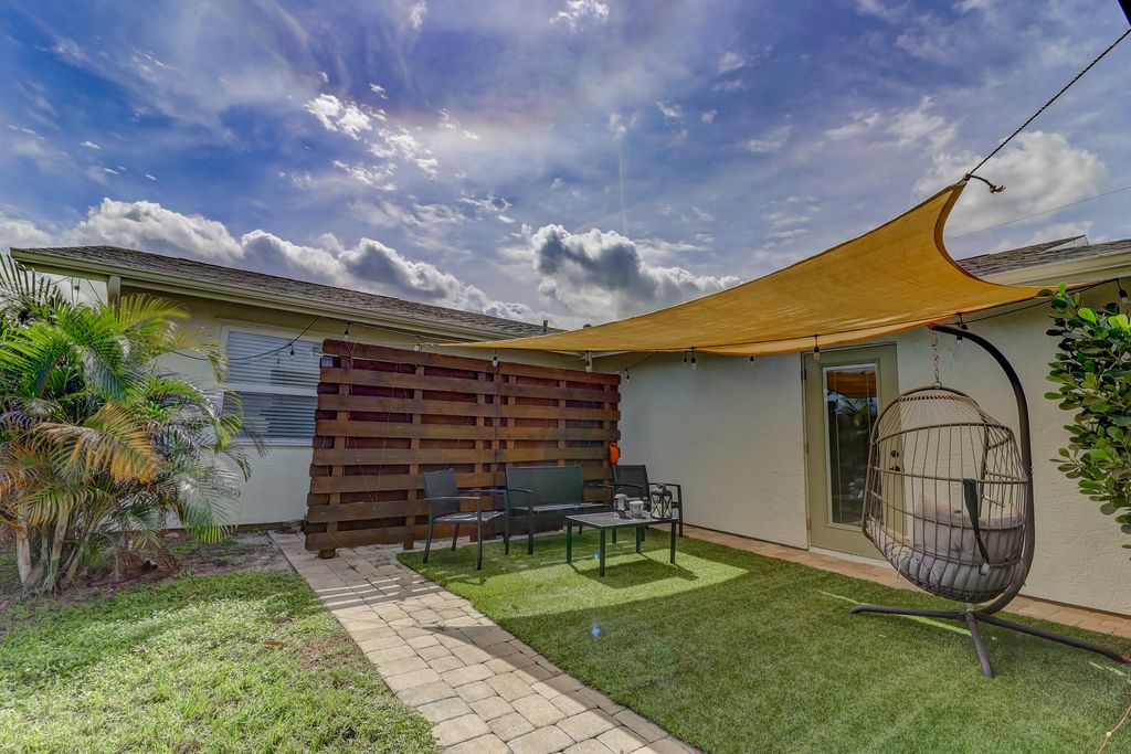 Photo of 463 NW Ravenswood Lane, Port Saint Lucie, FL 34983 (MLS # R10970172)