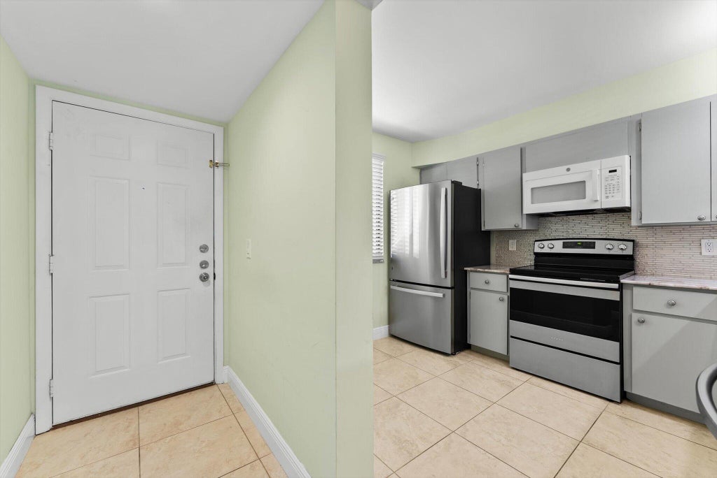 Photo of 6205 Balboa Circle #102, Boca Raton, FL 33433 (MLS # B26056598)