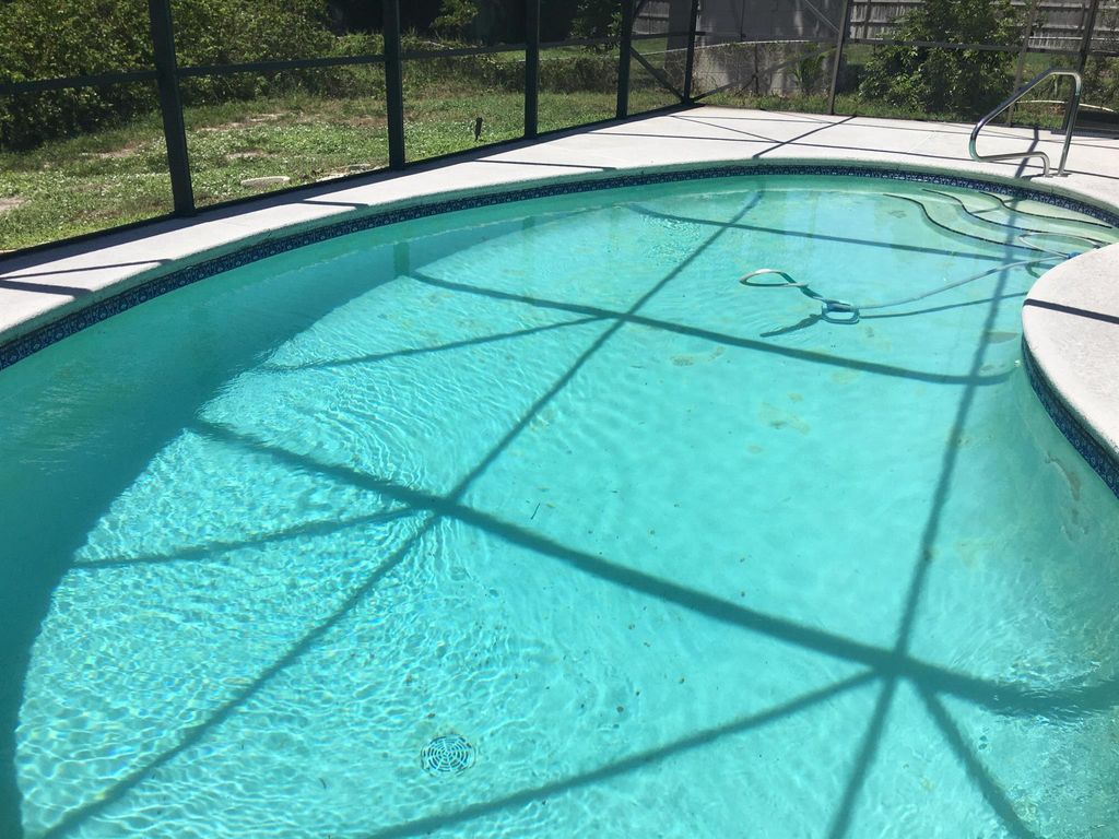 Photo of 1514 NE 24th Street, Jensen Beach, FL 34957 (MLS # R10909539)