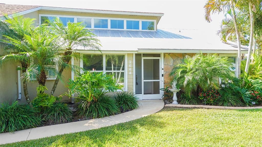 Photo of 2644 SW Dalpina Road, Port Saint Lucie, FL 34953 (MLS # R10753412)