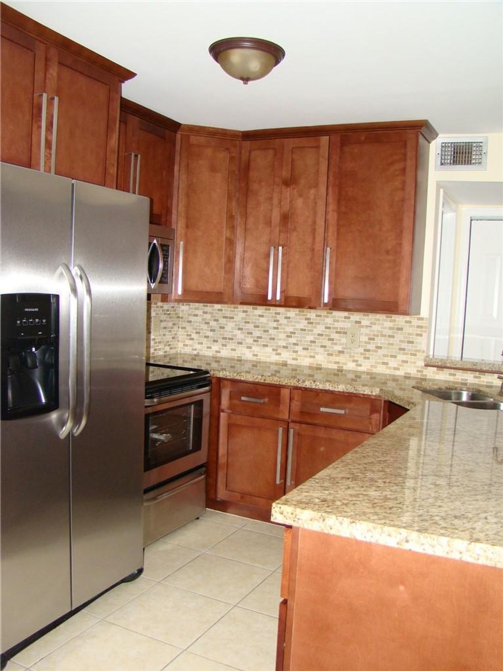 Photo of 9930 Royal Palm Blvd #9930, Coral Springs, FL 33065 (MLS # F10379590)