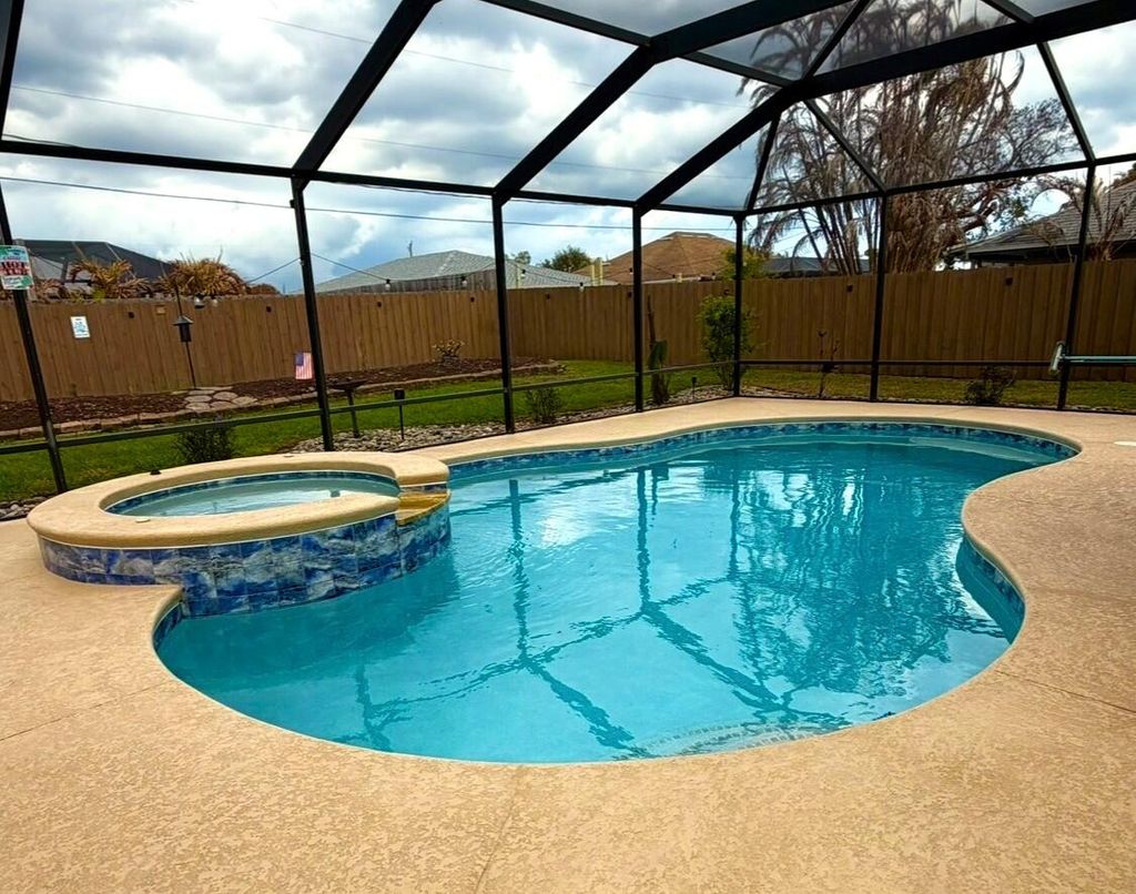 Photo of 2350 SE Calcutta Circle, Port Saint Lucie, FL 34952 (MLS # B26004142)