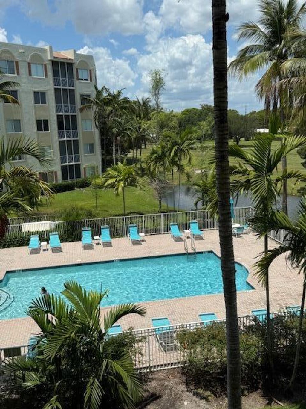 Photo of 3500 Oaks Clubhouse Drive #303, Pompano Beach, FL 33069 (MLS # B26023064)