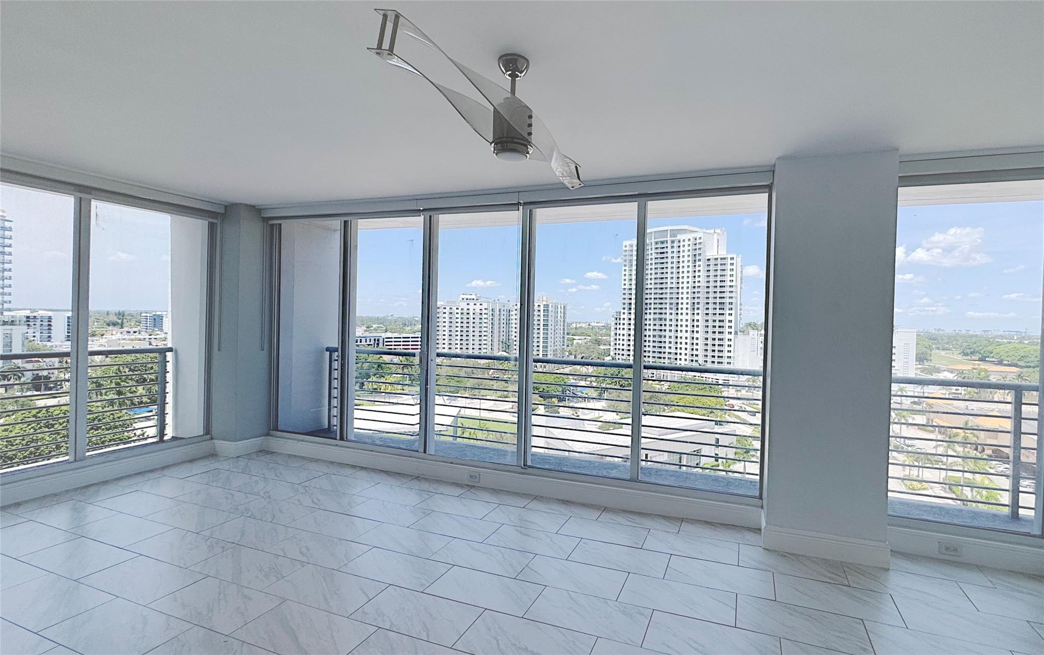 Enjoy living steps to endless dining and entertainment at Home Tower in Downtown Hollywood! This Large 1 Bedroom, 1 bath condo boasts an open concept with Wrap around floor to Ceiling windows, expansive views that stretch from downtown Hollywood to the Ocean. Newly Renovated with state of the art appliances, Quartz countertops, In-unit Laundry Room, community pool and a fitness center. Unit features 3 separate balconies, 2 off of the living room facing west and north and a balcony off the bedroom also with floor to ceiling windows. Great Walkability with Publix, Arts Park around the corner. Hollywood Beach Broadwalk is just over a mile away. Water and Cable included in rent. Parking is surrounding the building and is $175 per year for city permit.