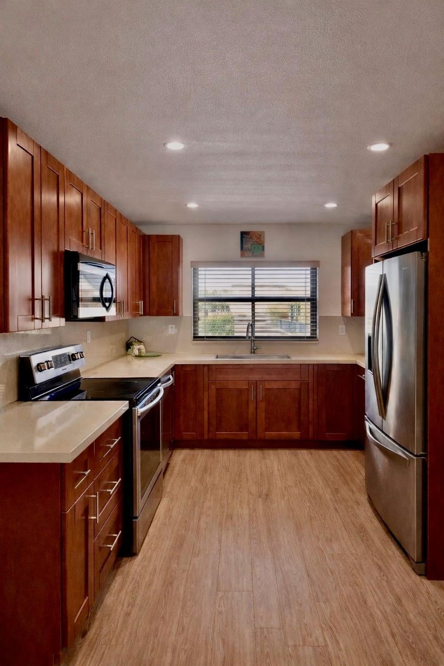 Beautifully maintained 55+ end-unit condo. This light-filled residence features impact windows throughout, offering peace of mind and energy efficiency. The upgraded kitchen boasts modern finishes and ample storage, perfect for everyday living and entertaining. Enjoy the convenience of an in-unit washer and dryer, plus the added privacy of an end unit with extra windows and natural light. Priced to sell, this home is ideal for buyers seeking comfort, value, and a low-maintenance lifestyle in a welcoming active adult community.NO ASSESSMENTS, HOA INCLUDES THE GOLF COURSENEWER ROOF, ELEVATOR, WATER HEATER, PLUS WASHER AND DRYER IN THE UNIT