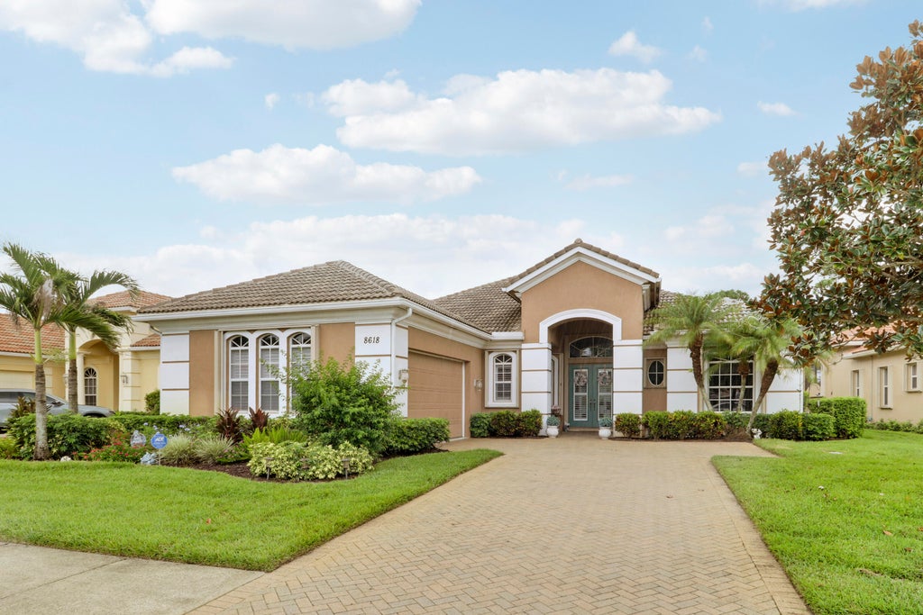 Photo of 8618 Tompson Point Road, Port Saint Lucie, FL 34986 (MLS # B26073559)