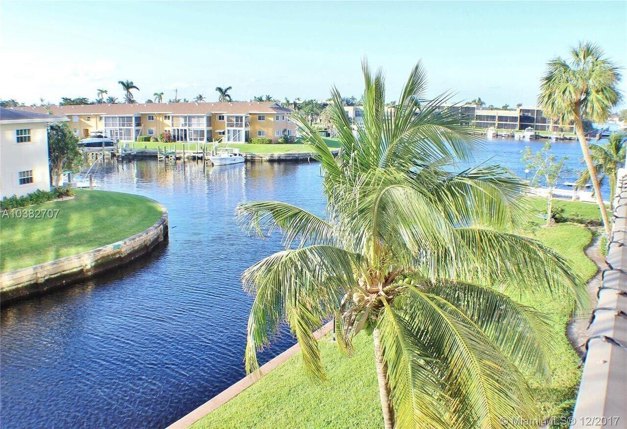 Light and Bright! Motorcycles are allowed. Take a drive by the building, please do not disturb the current tenant. Beautiful 3rd floor unfurnished 2 bed 2 bath on an ocean access canal. Laundry room and elevator are just steps away. There is a dock and there are beautiful sunsets here! Gorgeous lobby with secured entrances. $2550 a month for a 10-12-month lease. Modern and clean, tiled throughout. Your King-Sized Master Suite awaits. Water and Wi-Fi are included. Gym, pool, and a mile from the beach. Walk to shops and restaurants. No smoking. Landlord and property manager are local.