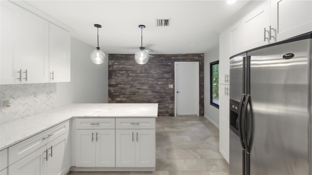 Photo of 619 Deer Creek North Shore Dr #619, Deerfield Beach, FL 33442 (MLS # F10531738)