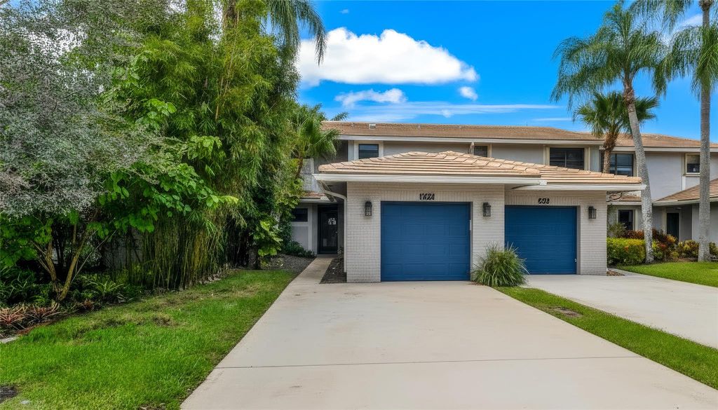 Photo of 619 Deer Creek North Shore Dr #619, Deerfield Beach, FL 33442 (MLS # F10531738)