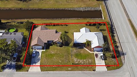 Photo of 2402-2408 SW Monterrey Lane, Port Saint Lucie, FL 34953 (MLS # R11129023)