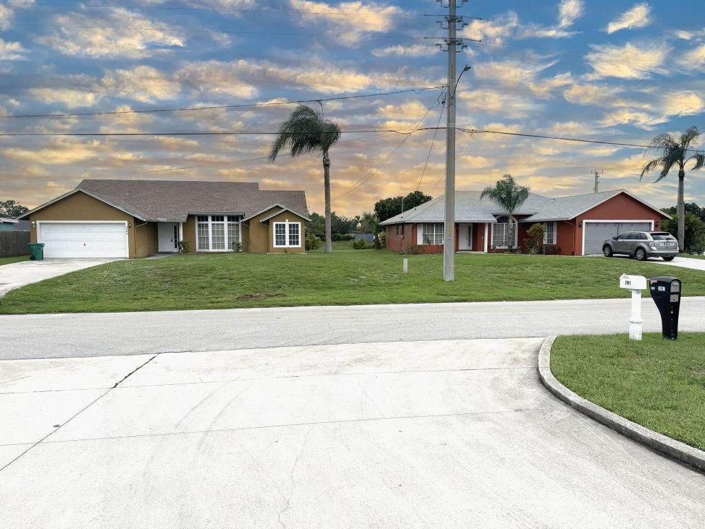 Photo of 24022408 SW Monterrey Lane, Port Saint Lucie, FL 34953 (MLS # R11129023)