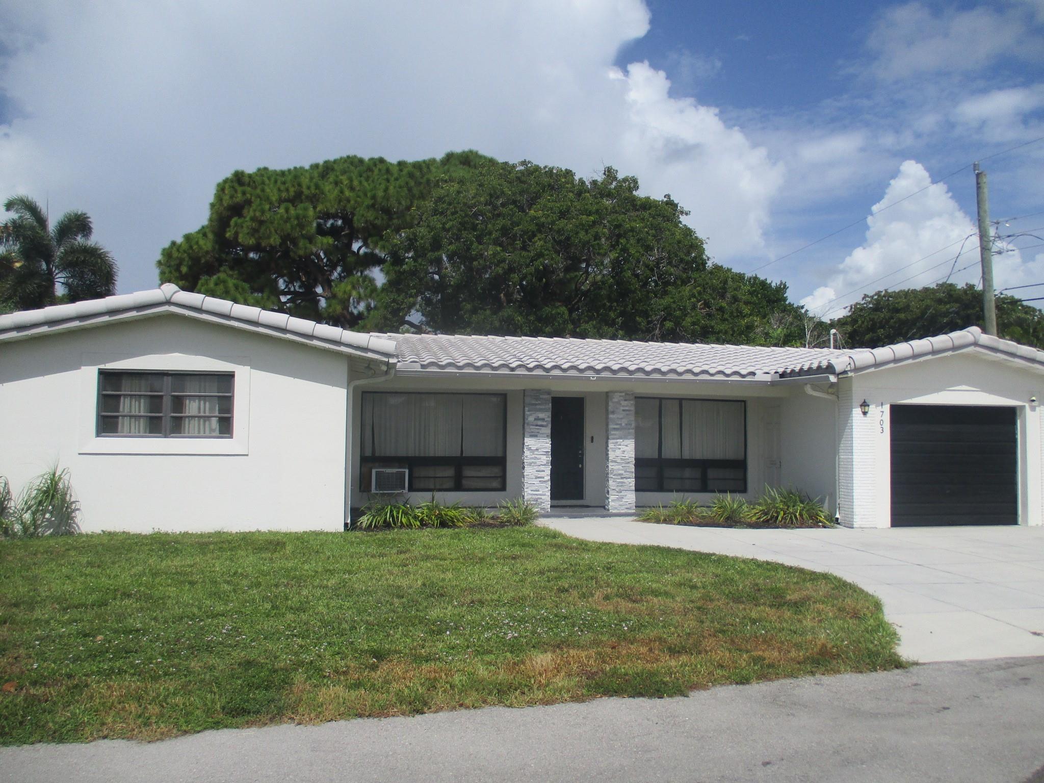 Gorgeous 3-Bedroom, 2-Bath Single-Family Home with Versatile Den as 3rd Bedroom. This beautifully updated and partially renovated single-family home features 3 bedrooms, 2 bathrooms, a 1-car garage, a Florida room, and a den that was utilized as the 3rd bedroom. The open-concept layout showcases laminate wood floors and a spacious kitchen with white shaker cabinets and stainless-steel appliances. Situated on a large lot with ample space for a pool, this home is located on a quiet dead-end street. Vacant and easy to show, this is a fantastic opportunity you don’t want to miss!
