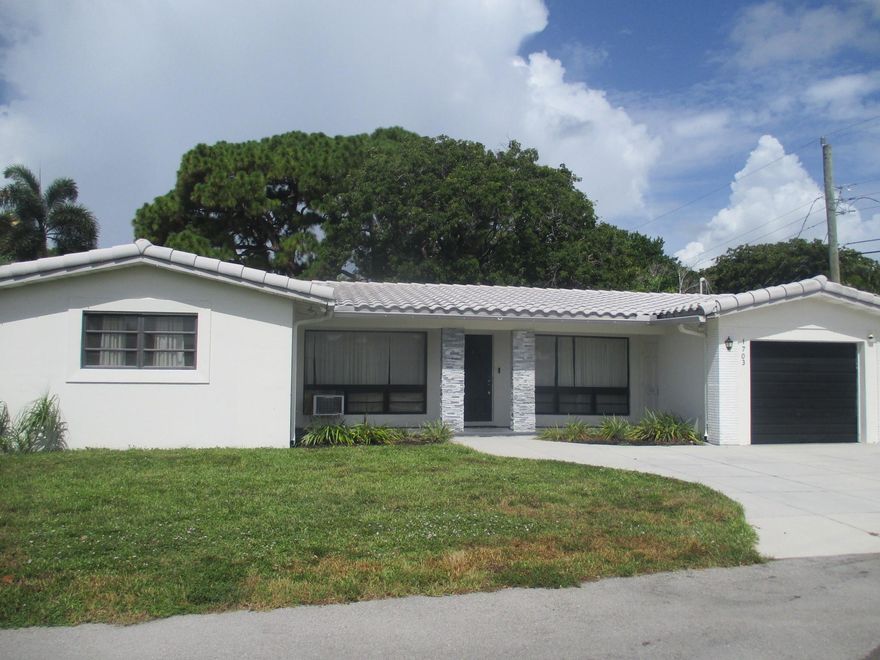 Gorgeous 3-Bedroom, 2-Bath Single-Family Home with Versatile Den as 3rd Bedroom. This beautifully updated and partially renovated single-family home features 3 bedrooms, 2 bathrooms, a 1-car garage, a Florida room, and a den that was utilized as the 3rd bedroom. The open-concept layout showcases laminate wood floors and a spacious kitchen with white shaker cabinets and stainless-steel appliances. Situated on a large lot with ample space for a pool, this home is located on a quiet dead-end street. Vacant and easy to show, this is a fantastic opportunity you don’t want to miss!