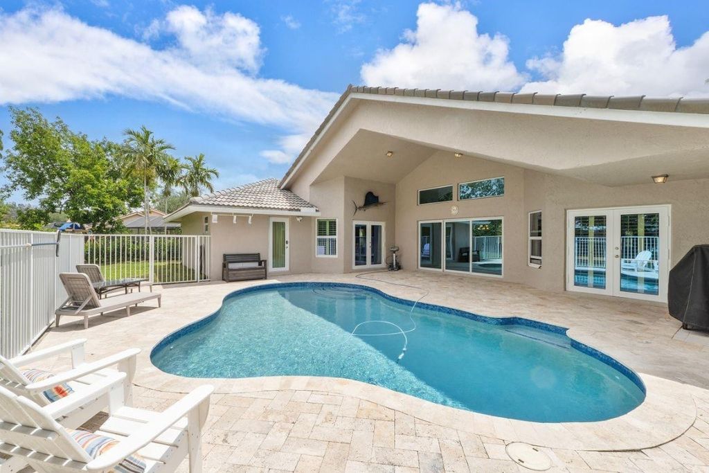 Photo of 9099 NW 52nd Court, Coral Springs, FL 33067 (MLS # F10498980)