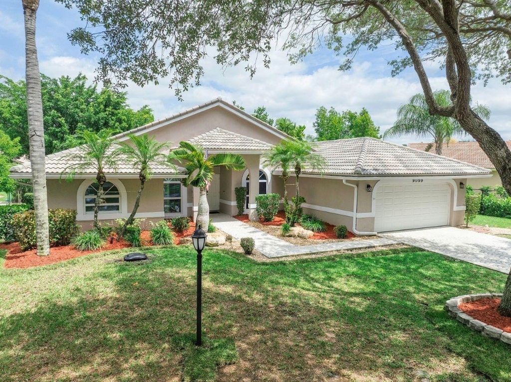 Photo of 9099 NW 52nd Court, Coral Springs, FL 33067 (MLS # F10498980)
