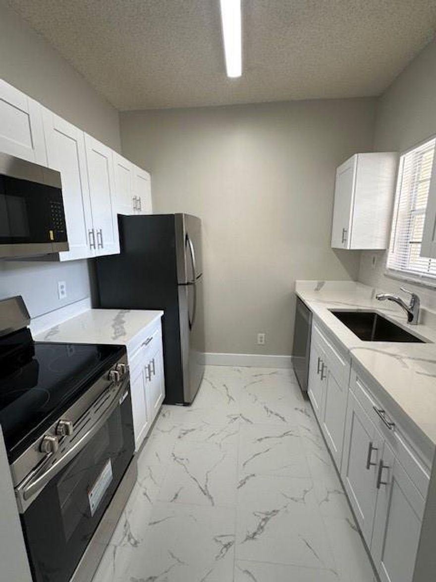 Brand new renovated 1 bedroom apartment.  Brand new kitchen, bathroom, floors, and more....  Second floor apartment with a screened in balcony.  Beautiful gated community with many amenities.  Rent includes high speed internet, cable, water, sewer, and trash.