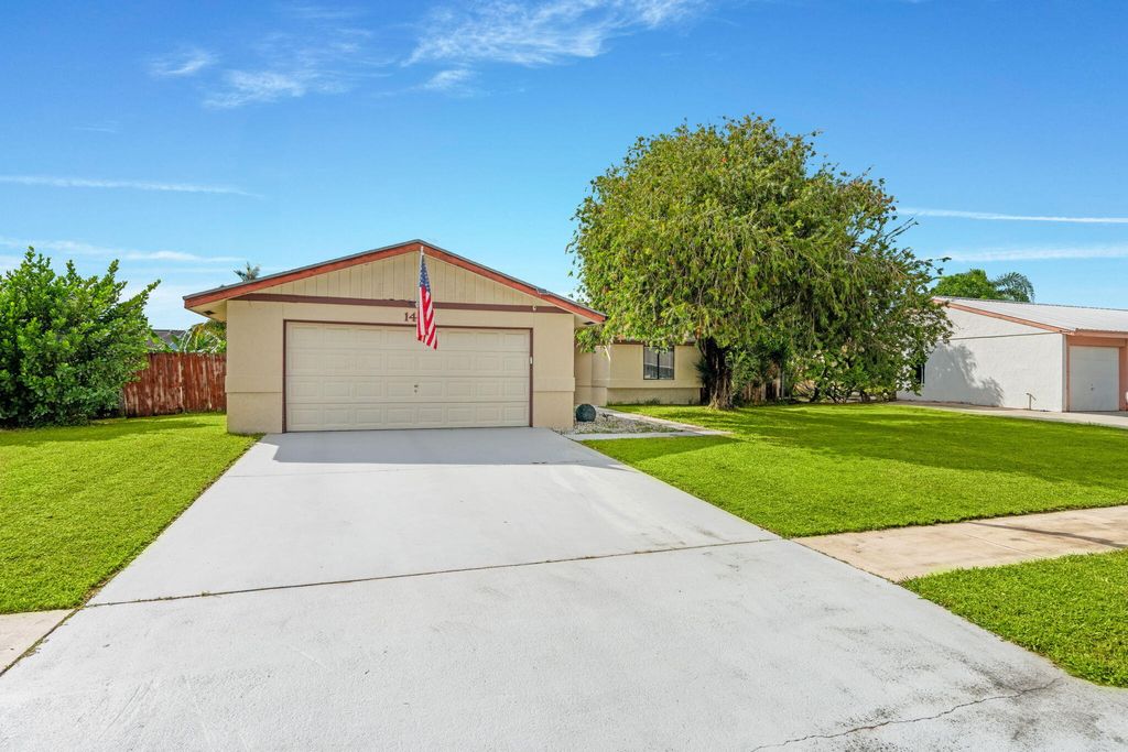 Photo of 1403 Donwoods Lane, Royal Palm Beach, FL 33411 (MLS # R11129440)