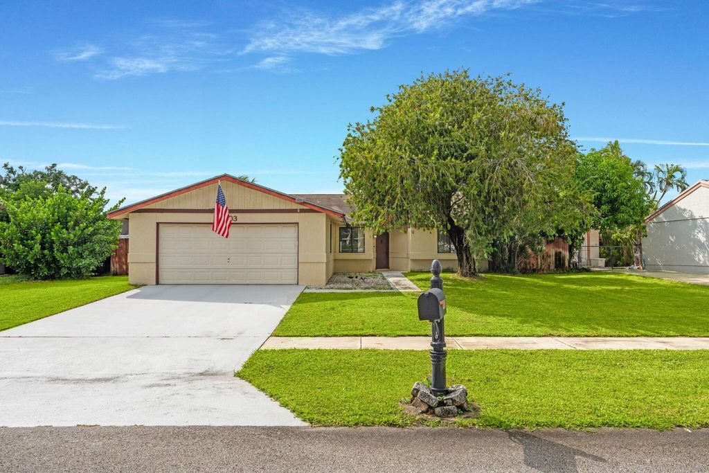 Photo of 1403 Donwoods Lane, Royal Palm Beach, FL 33411 (MLS # R11129440)