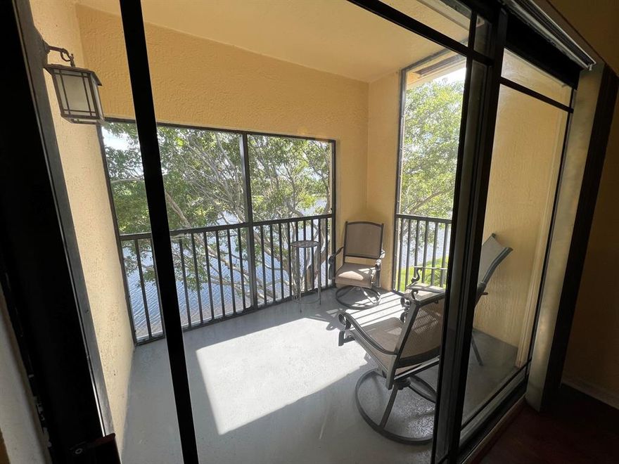 Water view! Unit can be rented furnished or unfurnished. Third floor unit with hurricane impact glass!!! Updated kitchen and bathroom. Wood and tile floor.Gated community with all amenities including swimming pool, hot tub, gym,steam room, racquetball court, soon to be completed tennis and pickleball court, playground. Walk to the Gardens mall, banking, restaurants. Bus stop is in walking distance at the mall. Third floor unit with lake view. Rent includes water, sewer and valet trash.