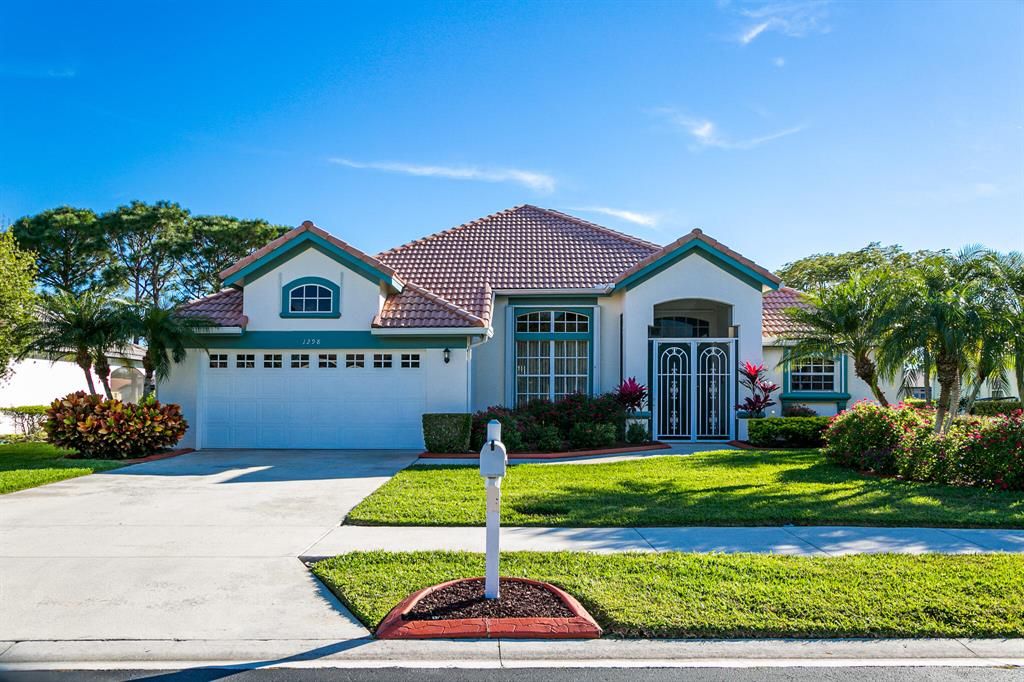 Photo of 1298 SW Briarwood Drive, Port Saint Lucie, FL 34986 (MLS # R10773118)