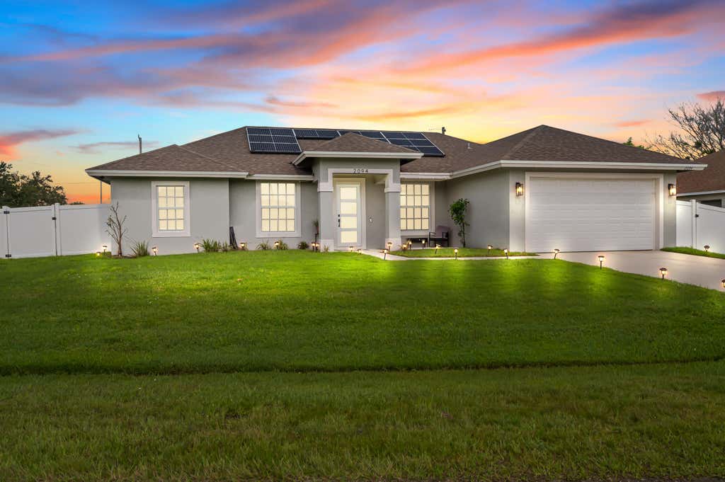 Photo of 2094 SW CAPEADOR Street, Port Saint Lucie, FL 34953 (MLS # B26055733)