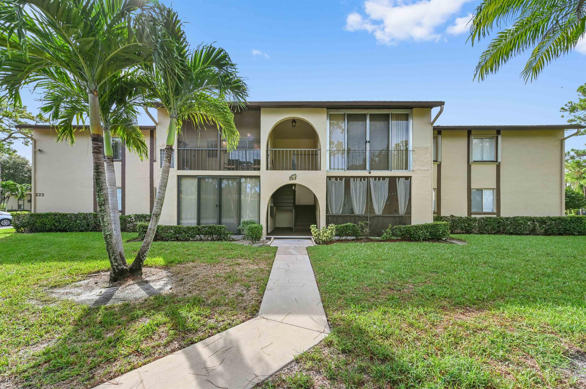 Welcome to Pine Ridge South Condo, a desirable 55+ community offering comfort and convenience. This well-maintained condo features 924 sqft of living space with 2 bedrooms and 2 bathrooms. Enjoy a bright living area that extends to a screened and closed balcony, perfect for relaxation. The kitchen is equipped with appliances, complemented by a countertop with bar seating for casual dining. A dedicated laundry room with a washer and dryer adds ease to everyday living.This community provides a welcoming atmosphere with amenities designed for an active lifestyle. A wonderful opportunity to enjoy low-maintenance living in a sought-after location.