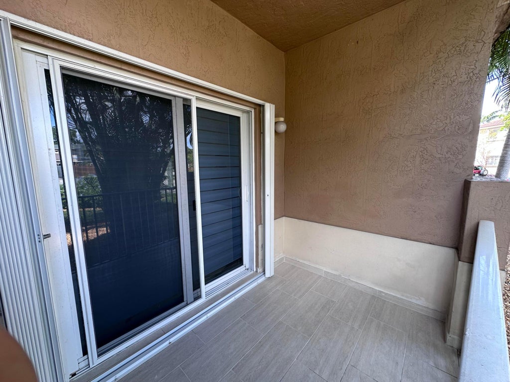 Photo of 300 E 4th Street #103, Hialeah, FL 33010 (MLS # B26037980)