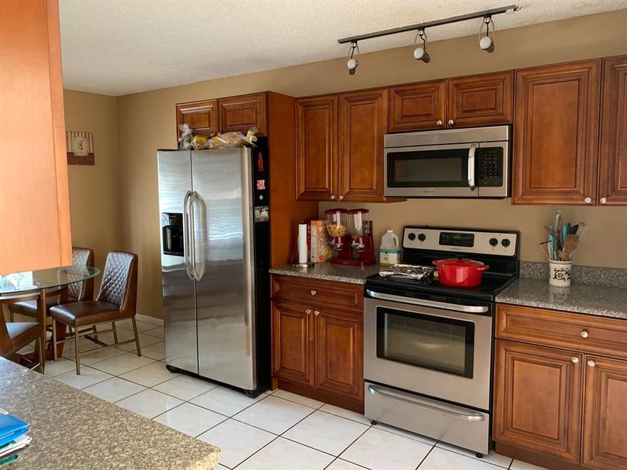 Beautiful home with lots of natural lights, vaulted ceilings, great size bedrooms and interior courtyard. Open patio runs parallel to side of house, great for entertaining. Laundry room/Office with private entrance is great for working at home. Close to major highways and shops