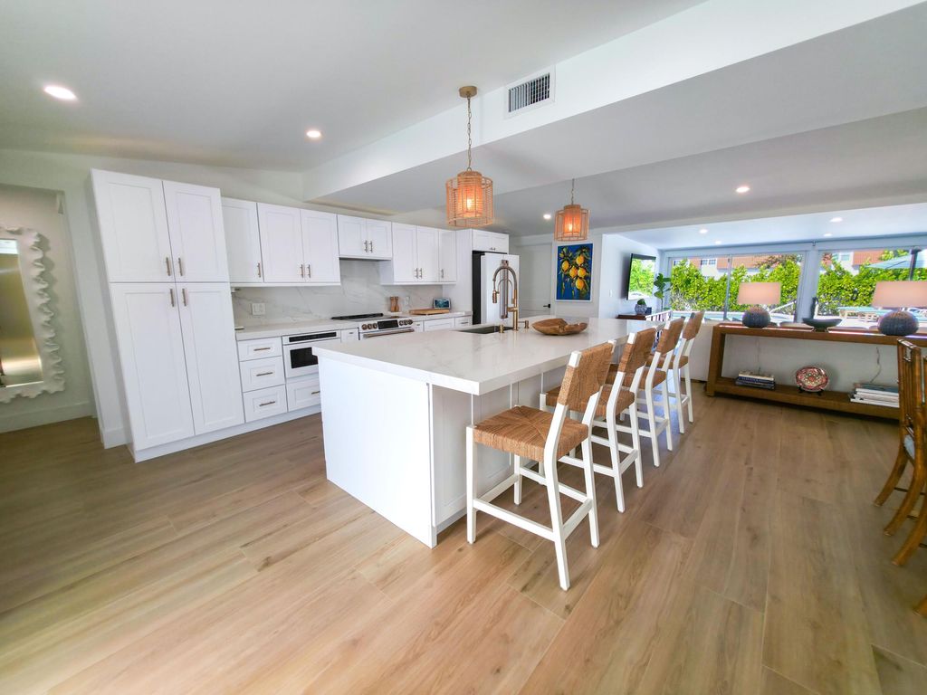 Photo of 720 Eastwind Drive, North Palm Beach, FL 33408 (MLS # R11106933)