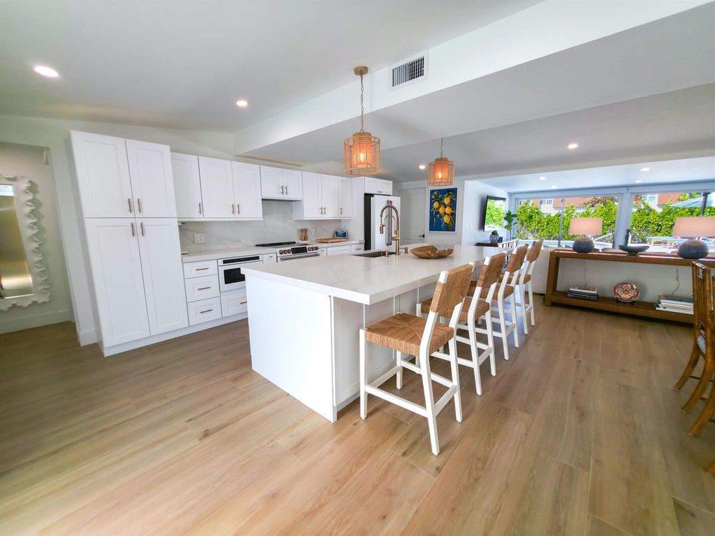 Photo of 720 Eastwind Drive, North Palm Beach, FL 33408 (MLS # R11106933)