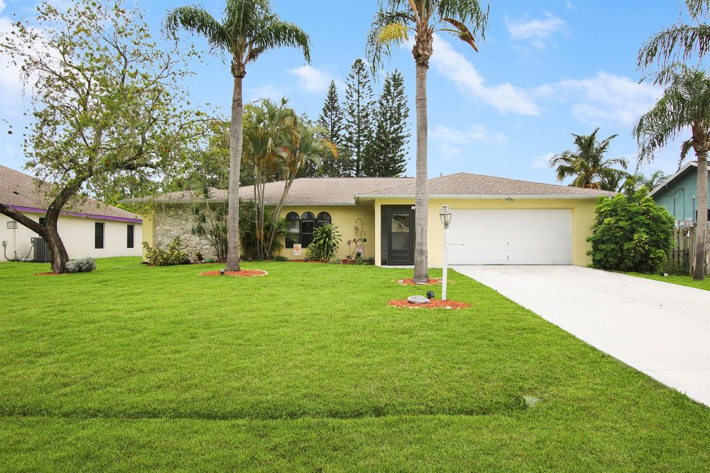 Photo of 1689 SE Harp Lane, Port St Lucie, FL 34983 (MLS # R10894706)