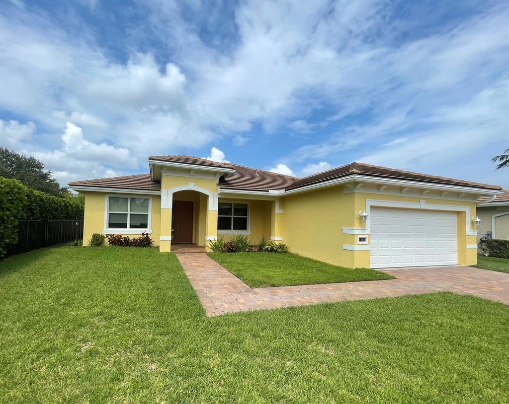 Photo of 480 NW Windflower Terrace, Jensen Beach, FL 34957 (MLS # R10935205)