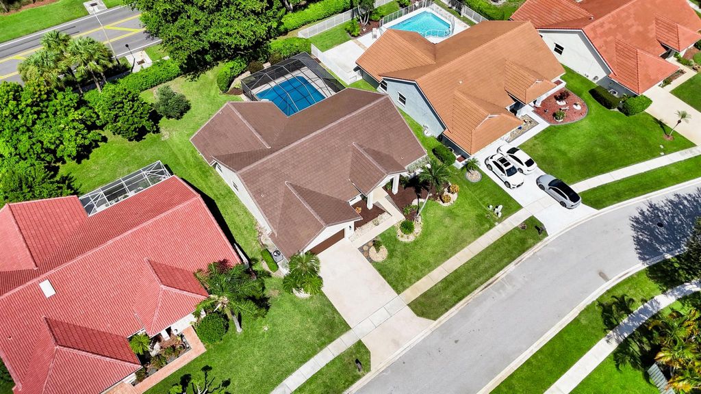 Photo of 5693 Lake Shore Village Circle, Lake Worth, FL 33463 (MLS # R11115820)