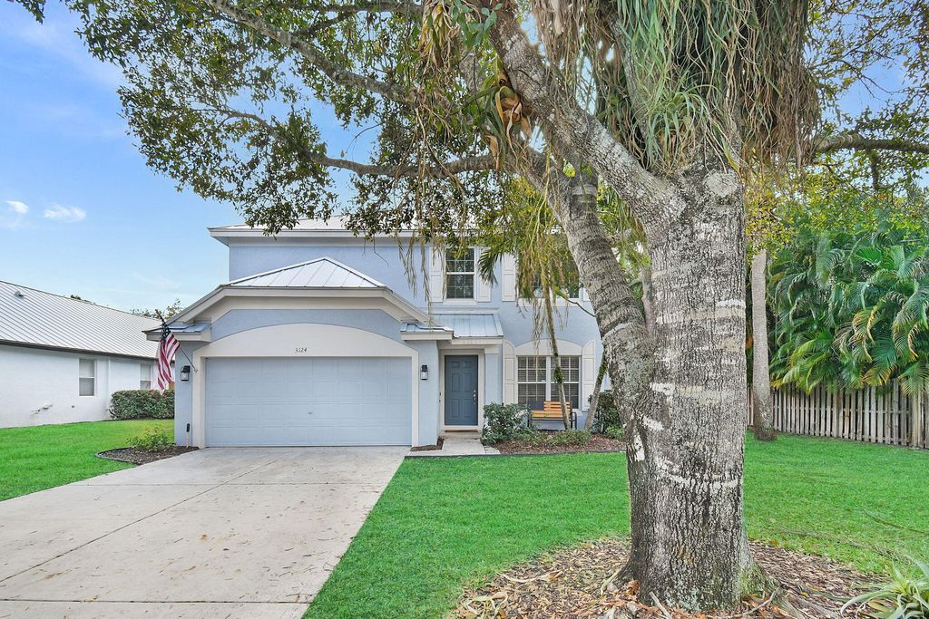Photo of 3124 SW Solitaire Palm Drive, Palm City, FL 34990 (MLS # R11158115)