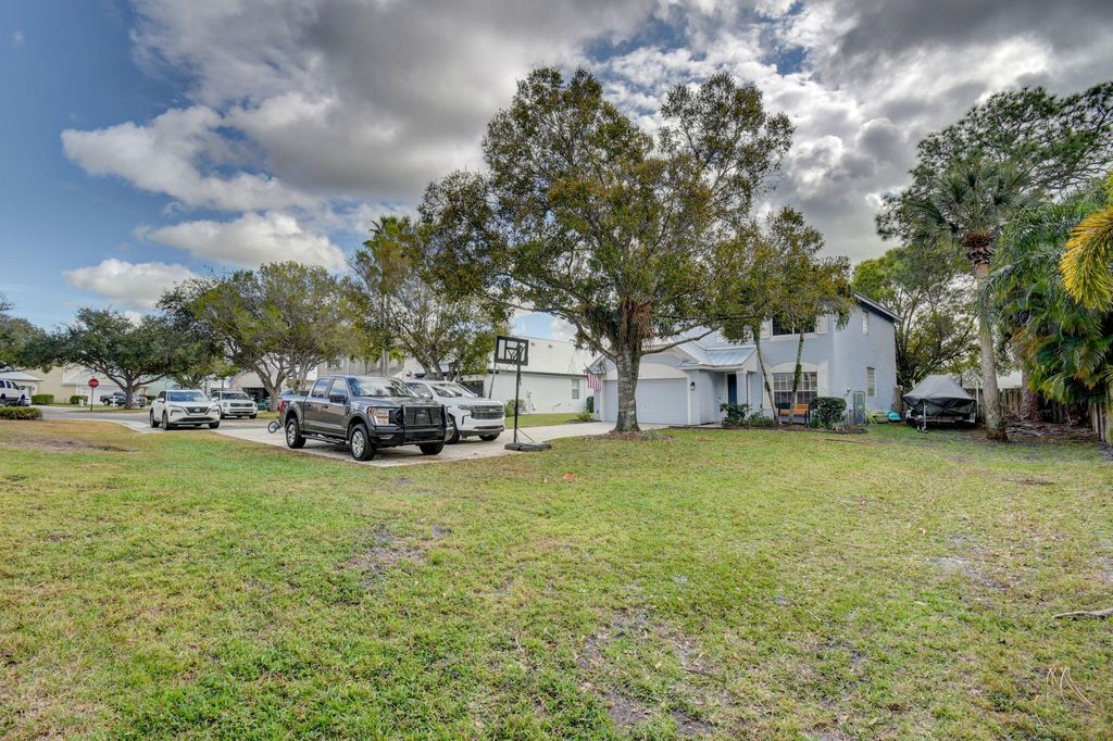 Photo of 3124 SW Solitaire Palm Drive, Palm City, FL 34990 (MLS # R11158115)