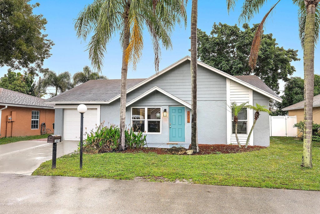 Photo of 14576 Sunset Pines Drive, Delray Beach, FL 33445 (MLS # R11147610)
