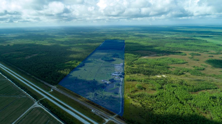 Once in a generation a property this remarkable becomes available.This rare 206 acre private ranch is located in southern Martin county. Used as a private getaway, this property enjoys the benefits of bordering protected Florida lands. Extremely private with over 80,000+ acres encompassing Corbett and Dupuis Wildlife Management Areas bordering the ranch. Only a short drive to Jupiter and the Palm Beaches. Zoned Martin County A-2 with 106 acres that are cleared and cross fenced, currently being utilized for cattle grazing. The property has a pump station in place to aid in disbursement of storm water. Two concrete built homes, one of which is a 3 bed 2.5 bath totaling 2600 sqft. The second home is a 3 bed 2 bath pool home totaling 1800 sqft.