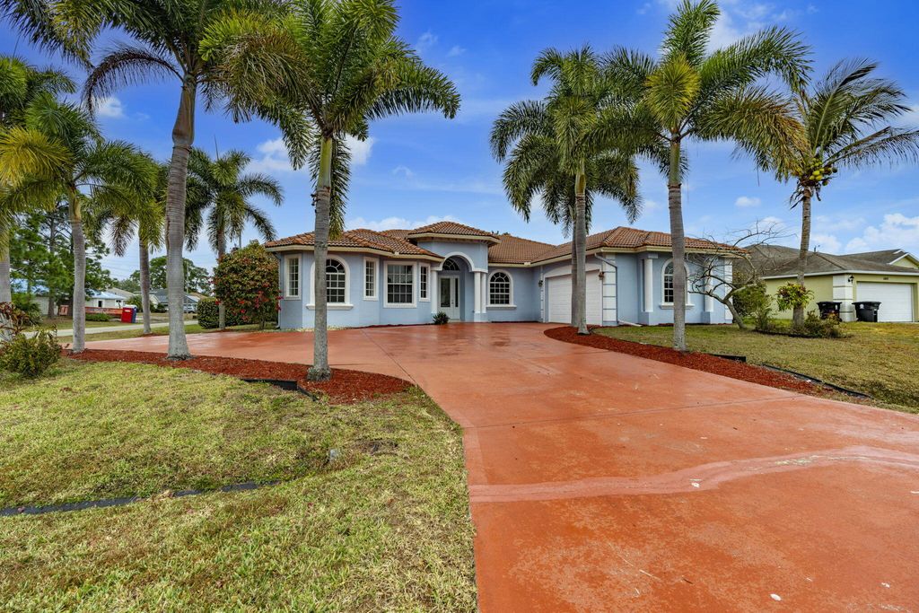 Photo of 1897 SW Citation AVE SW, Port Saint Lucie, FL 34953 (MLS # B26031038)