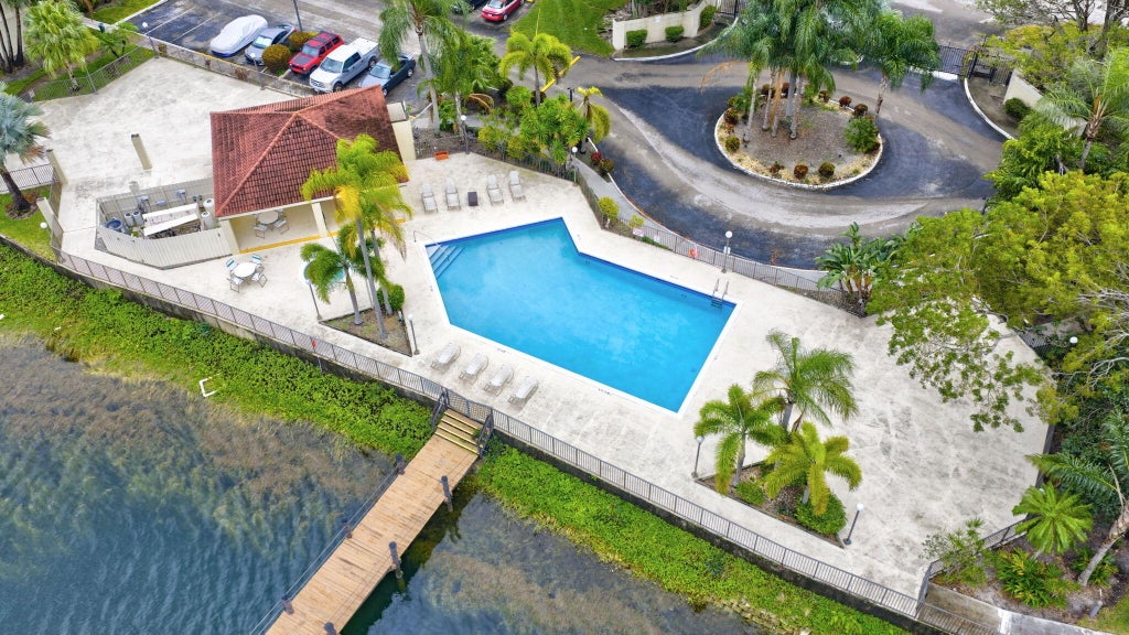 Photo of 117 LAKE EMERALD Drive #408, Oakland Park, FL 33309 (MLS # B26078944)